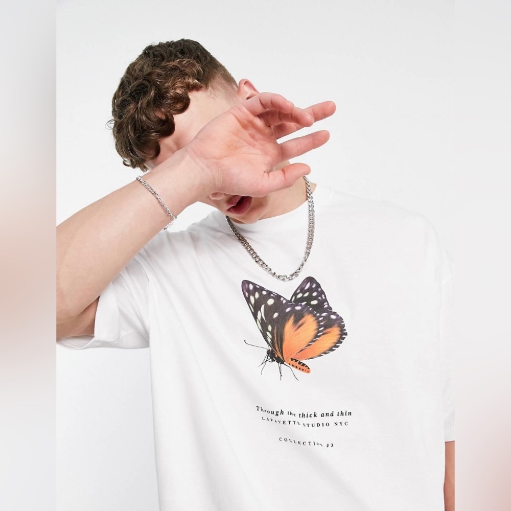 ASOS DESIGN oversized t-shirt in white with front butterfly & text print